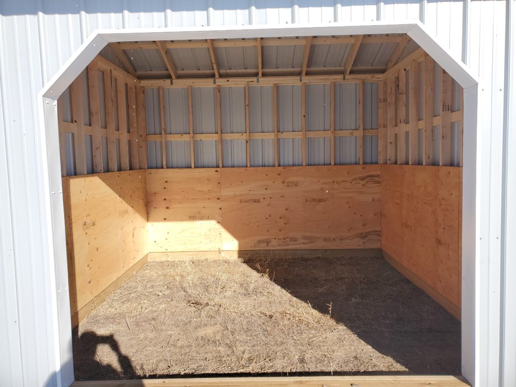 Horse Shelter 12x12 interior with wood lined sides